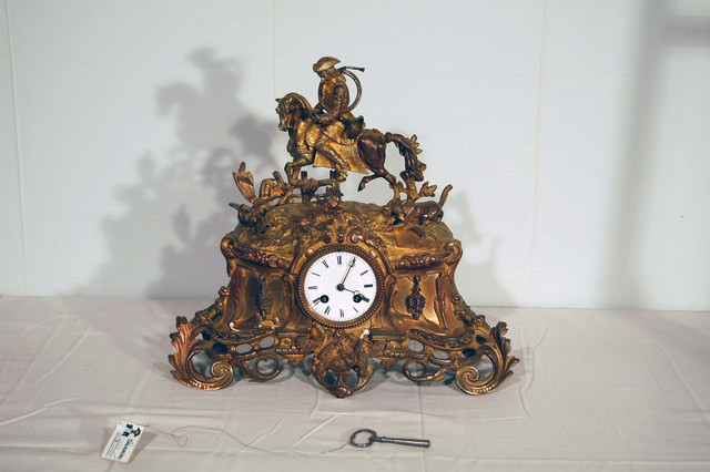 Mantelpiece clocks, gilt 